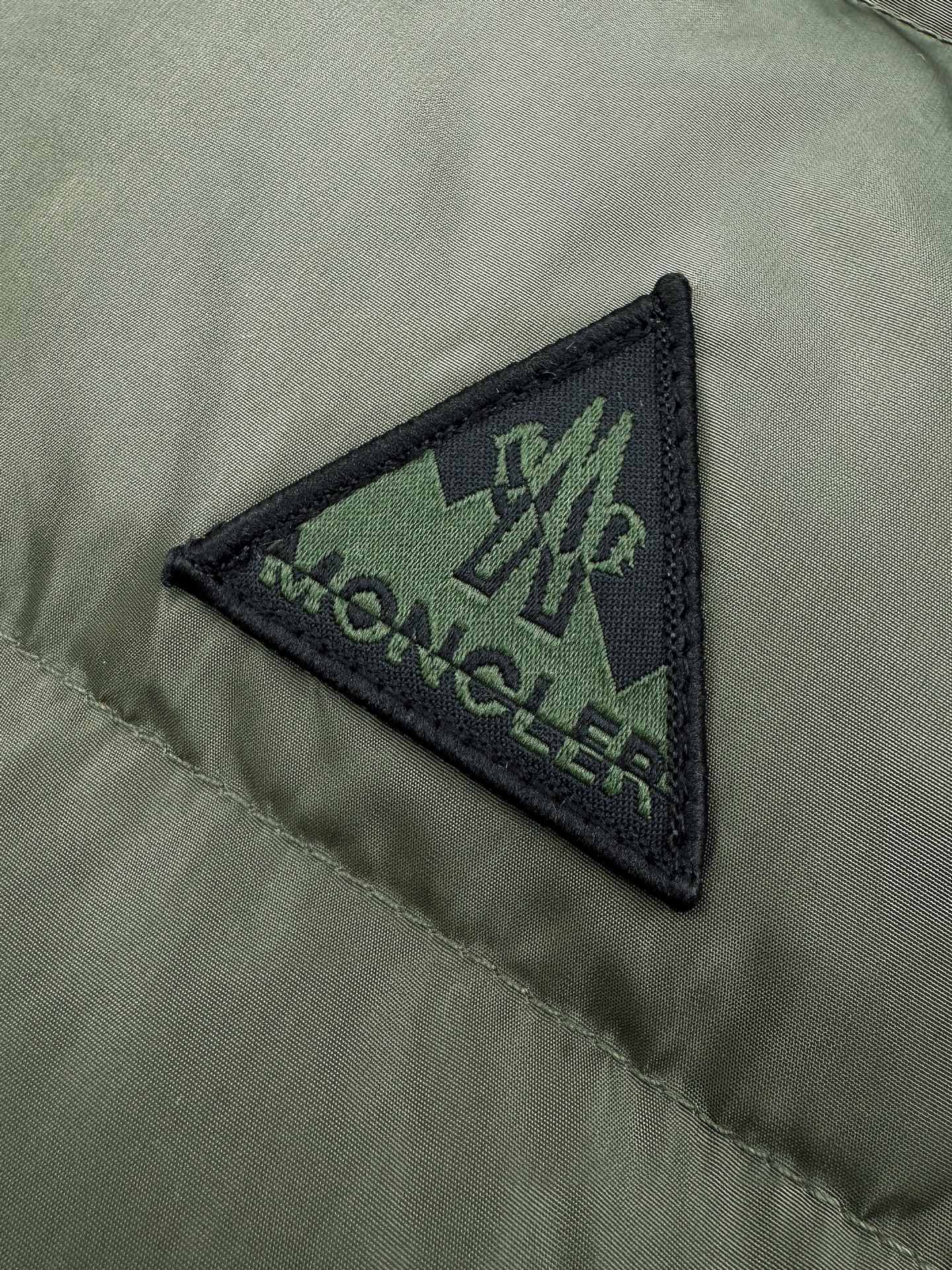 2026 New Mon Logo Woven Patchwork Down Jacket (25378-D10)