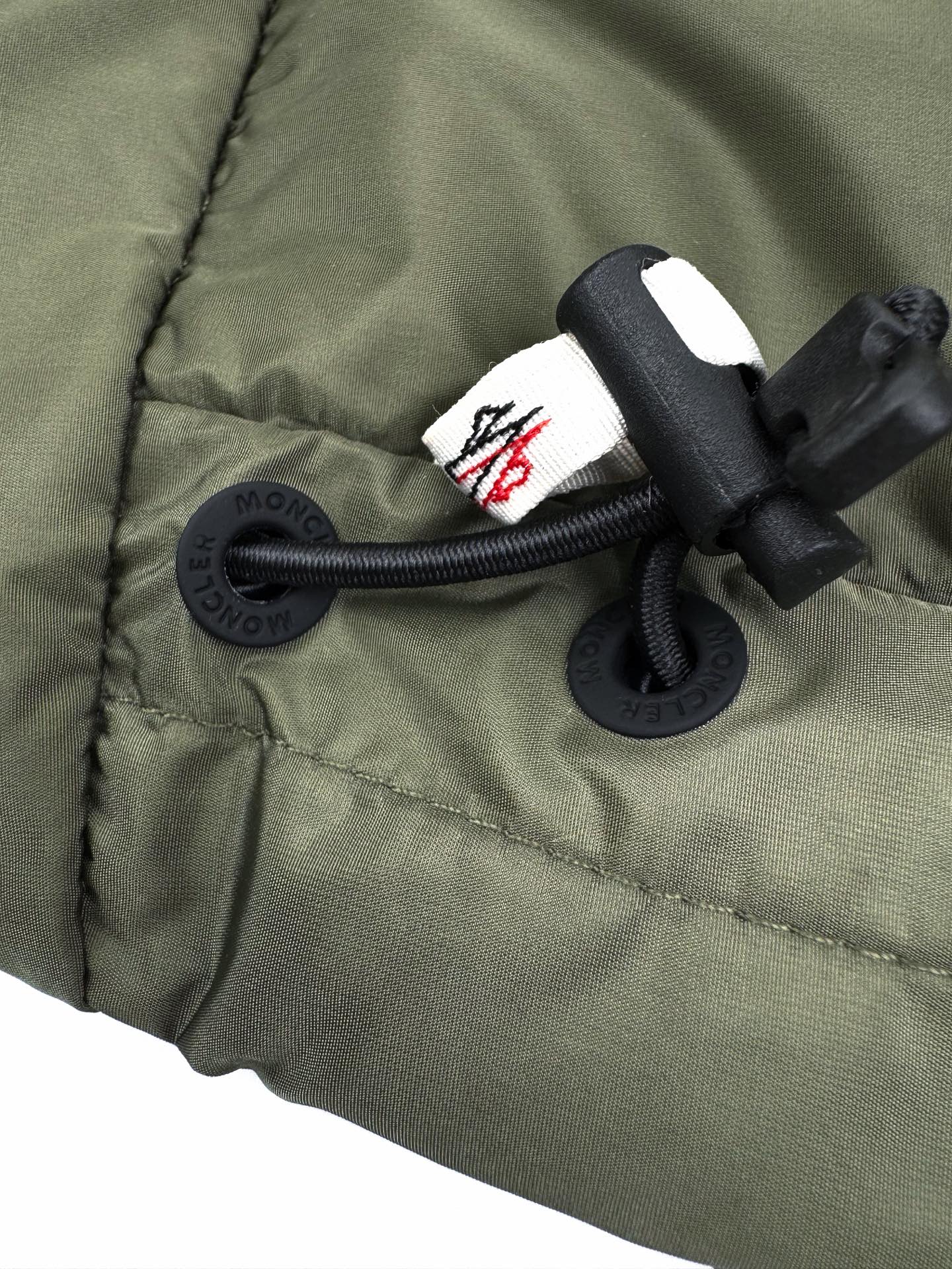 2026 New Mon Logo Woven Patchwork Down Jacket (25378-D10)