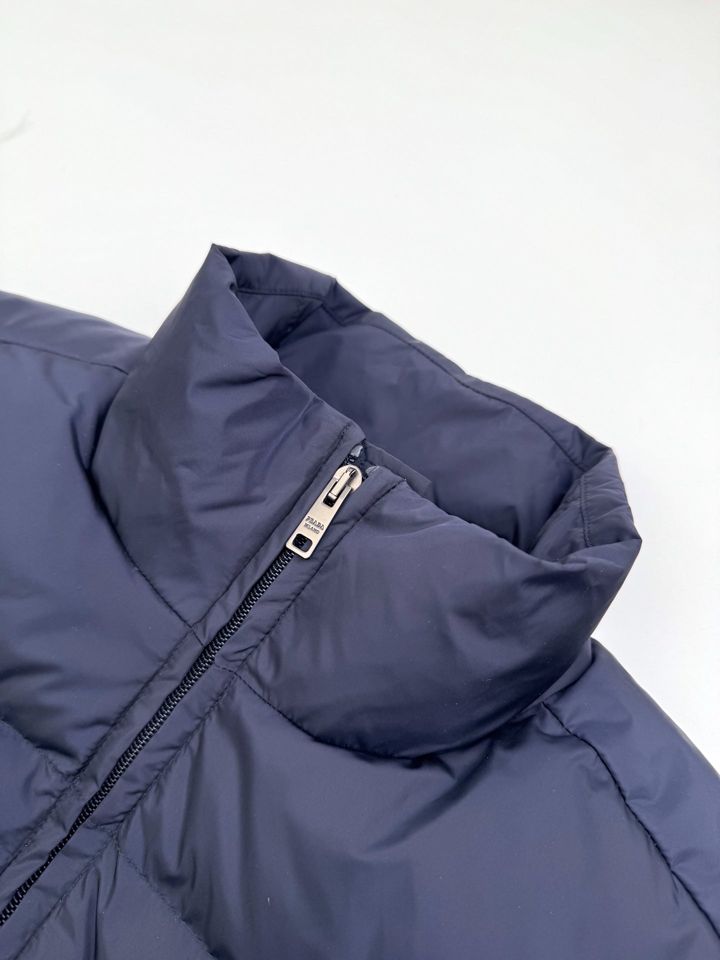 2026 New Triangle Brand Pocket Down Jacket (25297-D65)